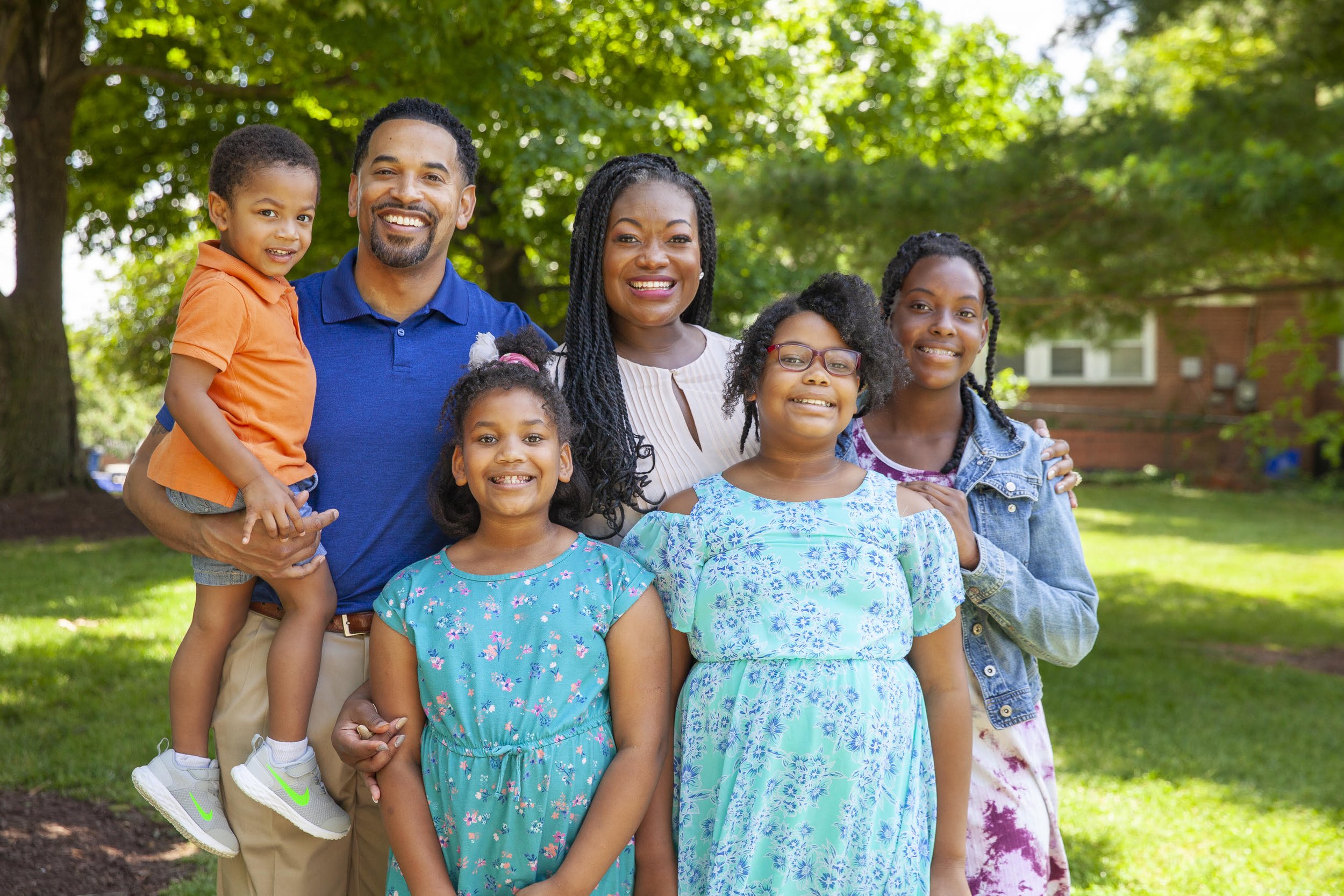 Will y su esposa Michele con sus hijos